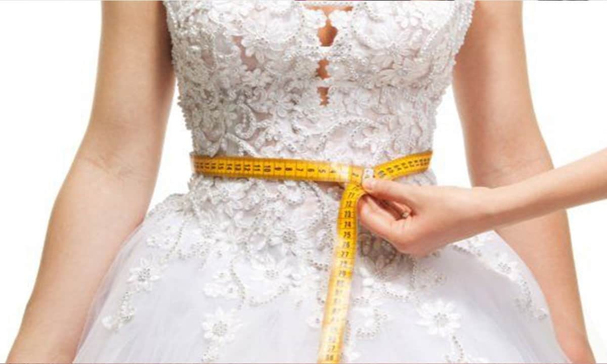 when to buy wedding dress if losing weight